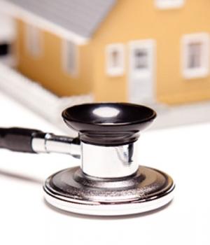 A stethoscope and a house