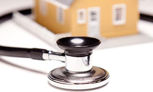 A stethoscope and a house